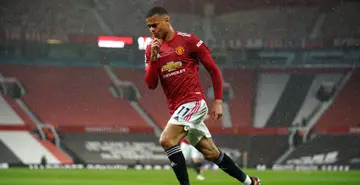 Mason Greenwood celebrates after scoring during the Premier League match between Manchester United and Leicester City at Old Trafford. Photo by Dave Thompson.