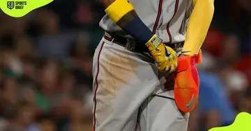 A Nike sliding mitt and batting glove