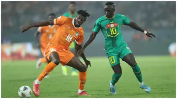 Ibrahim Sangare and Sadio Mane during the CAF Africa Cup of Nations round of 16 match between Senegal and the Ivory Coast. Photo: MB Media.