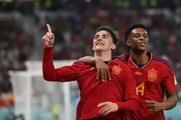 Spain midfielder Gavi (left) celebrates scoring his team's fifth goal against Costa Rica alongside Alejandro Balde