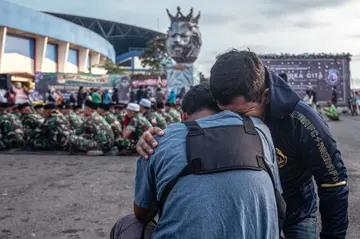 President Joko Widodo visited the site of the tragedy on Wednesday, ordering an audit of all stadia