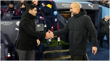 Mikel Arteta shakes hands with Pep Guardiola prior to the Emirates FA Cup match between Manchester City and Arsenal at Etihad Stadium. Photo by Matt McNulty.