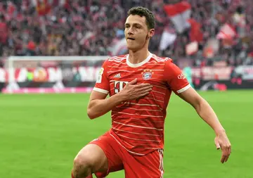 Defender Benjamin Pavard celebrates after scoring Bayern Munich's only goal in a draw against Hoffenheim on Saturday