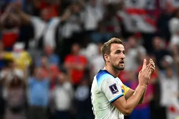 England captain Harry Kane salutes the crowd after his team's 3-0 last 16 win over Senegal