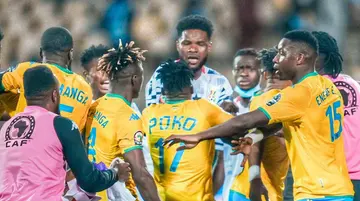 Ghanaian forward Benjamin Tetteh confronting Gabon players. SOURCE: Twitter/ @ghanasoccernet