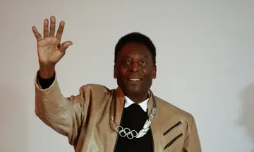 Pele waves after being decorated with an Olympic Order Medal in Sao Paulo, Brazil in 2016