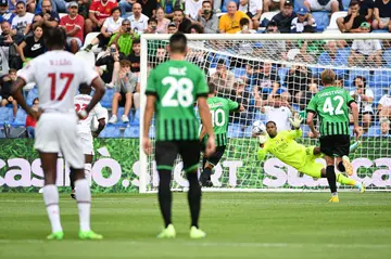Mike Maignan made sure Milan earned a point at Sassuolo with his penalty save