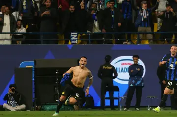 Lautaro Martinez celebrates his last-gasp winner for Inter Milan in the Italian Super Cup final