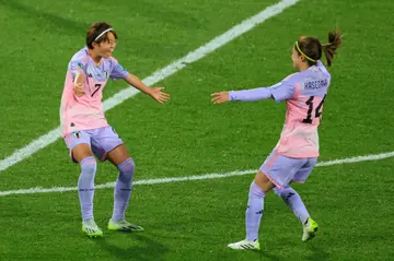 Japan's Hinata Miyazawa (L) celebrates scoring in their 3-1 win over Norway on Saturday
