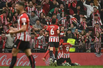 Athletic Bilbao forward Inaki Williams (R) celebrates with teammates after scoring his team's second goal in the derby