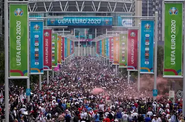Unrest: Fans gather at Wembley Stadium ahead of a Euro 2020 final football match between England and Italy on July 11, 2021 that was marred by violence involving spectators