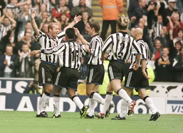 Newcastle United players are seen celebrating