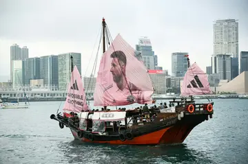 A junk with the face of Lionel Messi on its sail in Hong Kong’s Victoria Harbour