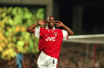Ian Wright of Arsenal celebrates his goal during a match against West Ham on 24 September 1997