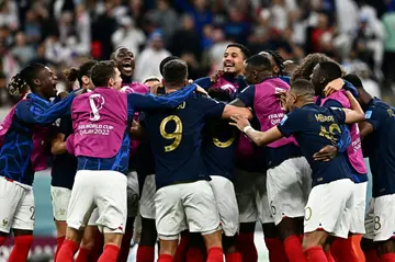 France celebrate reaching the World Cup semi-finals by beating England in Qatar