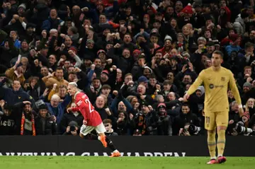 Antony celebrates the goal that edges Manchester United past Barcelona