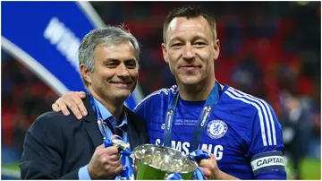 Jose Mourinho and John Terry pose with the trophy during the Capital One Cup Final match between Chelsea and Tottenham Hotspur at Wembley Stadium. Photo by Clive Mason.