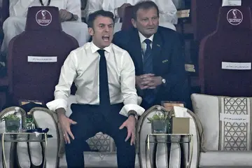 Emmanuel Macron was frequently out of his seat in the VIP box at Lusail Stadium, north of Doha