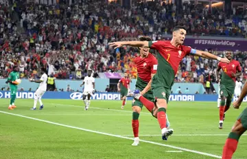 Portugal forward Cristiano Ronaldo celebrates scoring his team's first goal against Ghana