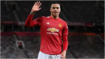 Mason Greenwood celebrates after scoring during The Emirates FA Cup Fourth Round match between Manchester United and Liverpool at Old Trafford. Photo by Laurence Griffiths.