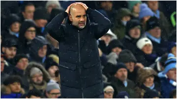  Pep Guardiola gestures on the touchline during the English Premier League football match between Manchester City and Tottenham Hotspur. Photo by Darren Staples.