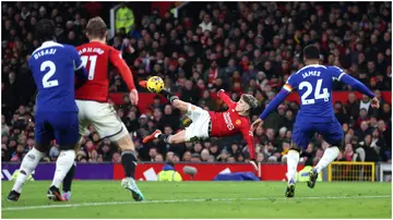 Alejandro Garnacho shoots but misses during the Premier League match between Manchester United and Chelsea FC at Old Trafford. Photo by Clive Brunskill.
