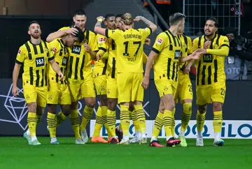 Karim Adeyemi (2L) grabbed the opener for Dortmund in their victory at Leverkusen