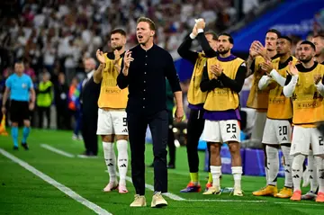 Julian Nagelsmann (C) overseeing Germany's opening victory against Scotland at Euro 2024