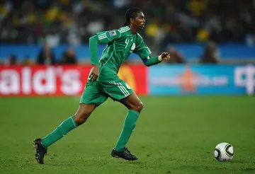  Nwankwo Kanu of Nigeria runs with the ball during the FIFA World Cup South Africa Group B match at Durban Stadium