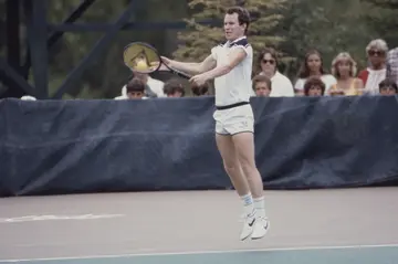 John McEnroe competing in Pro Am celebrity tennis tournament, The Aspen Tennis Festival, for ABC Sports, Circa 1984