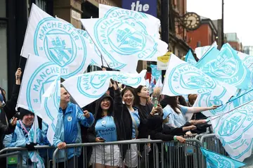 Manchester City fans celebrated a fourth consecutive Premier League title on Sunday