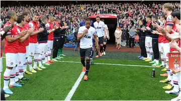 Arsenal players form a guard of honour for Premier League champions Manchester United at Emirates Stadium in 2013. Photo by Stuart MacFarlane.