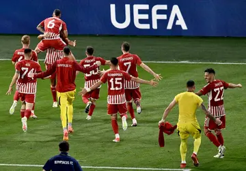Olympiakos' players celebrate after winning the UEFA Europa Conference League final
