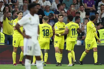 Villarreal players celebrate during their stunning 3-2 win over Real Madrid at the Santiago Bernabeu