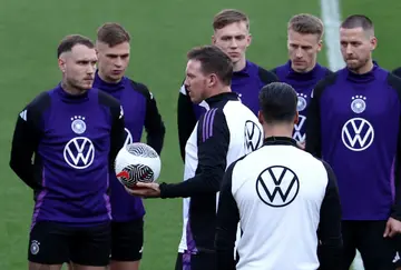 Listen and learn: Germany coach Julian Nagelsmann speaks to his players during a training session on Friday