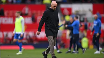 Erik ten Hag looks dejected following defeat after the Premier League match between Manchester United and Brighton at Old Trafford. Photo by Michael Regan.