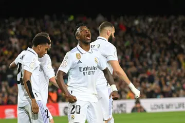 Real Madrid winger Vinicius Junior celebrates after scoring his team's first goal in the rout of Barca