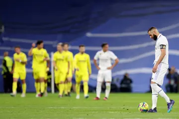 Karim Benzema reacts to Villarreal's first goal scored by Samuel Chukwueze