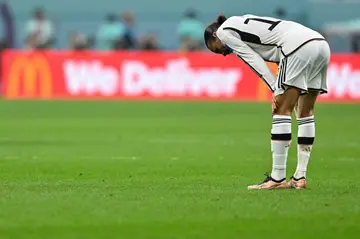 Germany's dejected forward Serge Gnabry after the four-time World Cup winners were eliminated at the group stage