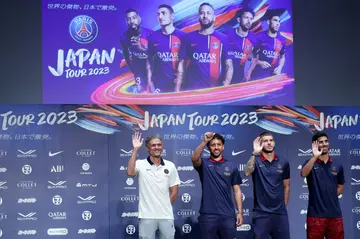 PSG coach Luis Enrique (L) attends a press conference in Osaka with captain Marquinhos (2L), Lucas Hernandez (3L) and Marco Asensio