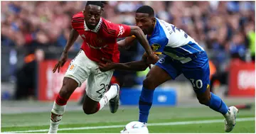 Aaron Wan-Bissaka and Pervis Estupinan in action during the FA Cup semi-final match between Brighton and Manchester United at Wembley. Photo by Will Palmer.