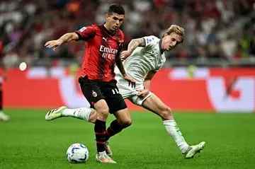 USA international Christian Pulisic (L) set Milan on their way to victory over Lazio