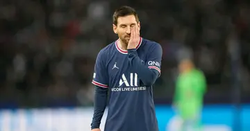 Lionel Messi looks dejected during the UEFA Champions League Round Of Sixteen Leg One match between Paris Saint-Germain and Real Madrid at Parc des Princes on February 15, 2022 in Paris, France. (Photo by Alex Gottschalk/DeFodi Images via Getty Images)