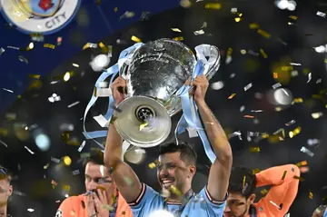 Rodri holds the Champions League trophy aloft after scoring the winner for Manchester City against Inter Milan in last season's final