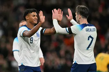 England's Ollie Watkins (L) celebrates with Jack Grealish after scoring against Australia