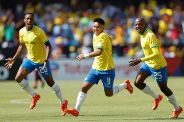 Chilean Marcelo Allende (C) celebrates scoring for Mamelodi Sundowns in a 5-2 CAF Champions League Group B victory over Al Ahly in Pretoria on March 11, 2023.