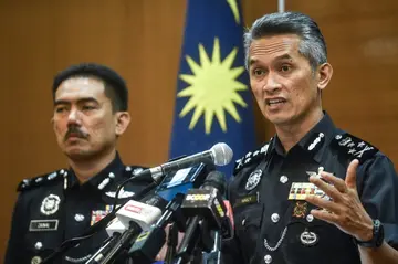 Mohamad Shuhaily Mohamad Zain (right), the police criminal investigation department director, said they have yet to determine the motive and if the attacks were connected