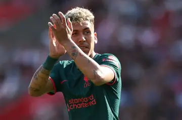 New start: Roberto Firmino applauds Liverpool fans when he left the club in May