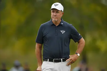Phil Mickelson reacts during day one of the LIV Gol at Rich Harvest Farms