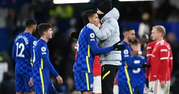 Thiago Silva of Chelsea is congratulated by Thomas Tuchel, Manager of Chelsea after the Premier League match between Chelsea and Manchester United at Stamford Bridge on November 28, 2021 in London, England. (Photo by Shaun Botterill/Getty Images )